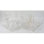 A clear glass dressing table set, includes candlesticks, tray, scent bottle, jar and cover, together