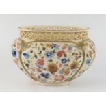 A Zsolnay Pecs oval posy vase, with pierced rim, the body of lobed oval form, decorated with