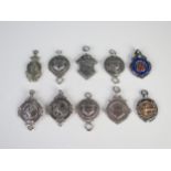 Ten assorted silver sport medallions and fobs, various makers and dates, total weight of silver