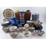 A collection of assorted Chinese ceramics including ginger jar, rice bowls, plates and vase,