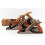 A polished wood jack plane, together with two smoothing planes, (3).