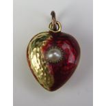A Victorian Precious Yellow Metal Heart Shaped Memorial Pendant with enamel and untested pearl