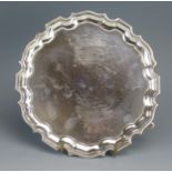 A George VI silver waiter, makers mark indistinct, London, 1942, of circular form with moulded