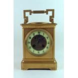 The Sussex Goldsmiths & Silversmiths Co, Brighton, a giant gilt brass carriage clock, with 10cm