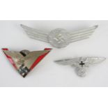 A Third Reich period Luftwaffe metal and enamel badge, with national Emblem , a cap badge and a