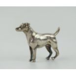 A white metal model of a hound, unmarked, 7cm long, 87gms, 2.81ozs.