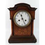 A late Victorian mahogany and inlaid mantel clock, with 13cm enamel Arabic dial, the movement