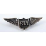 A Rare Pan American Airways 1930's one year service lapel badge.