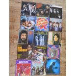 A collection of assorted 33rpm and 45rpm records, artists include The Sweet, Roy Orbison, The Kinks,