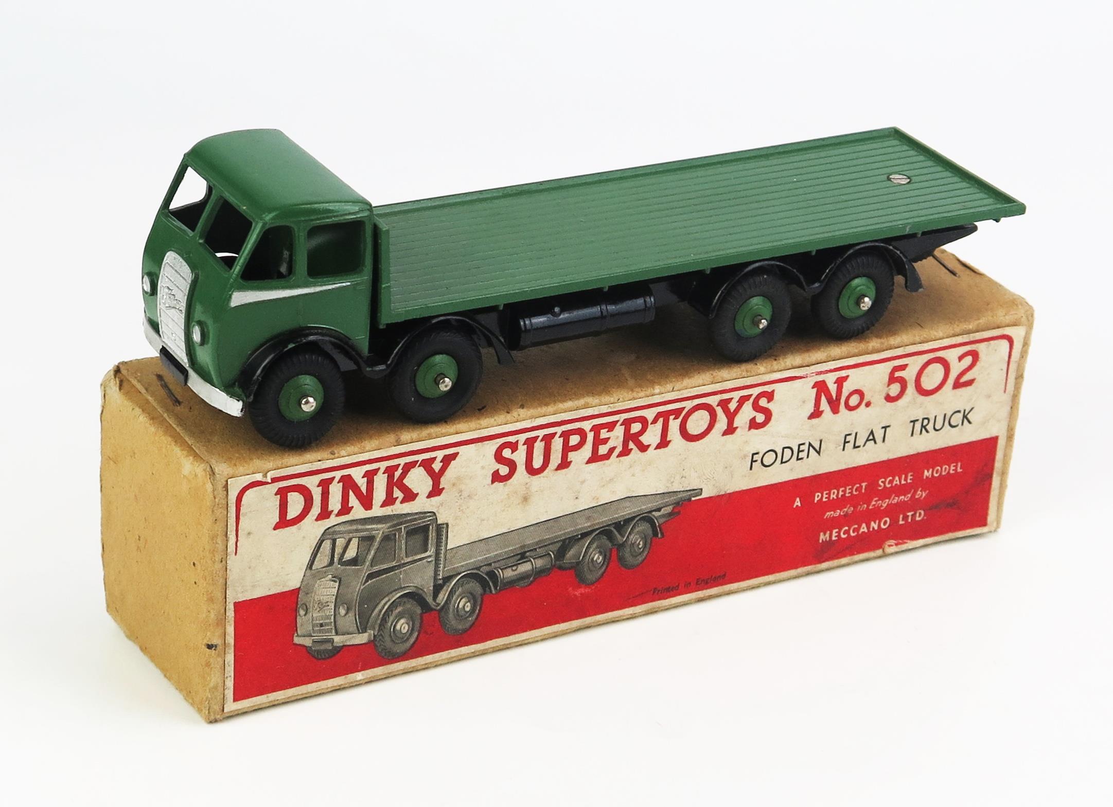 Dinky 502 Foden Flat Truck - dark green cab, back and ridged hubs, silver flash, black chassis,