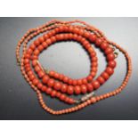 A Restrung Antique Coral bead Necklace (15.5", 19cm, 21.8g) and one other