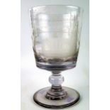 A 19th century large lead glass rummer, with etched decoration of the suspension bridge over the