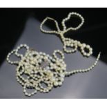 A 16.5" Pearl Necklace with barrel clasp (largest pearl c. 7mm, 8.6g) and two others with damaged