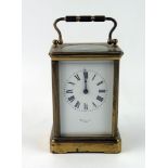 A French brass carriage clock, the movement with lever platform escapement, and 7cm Roman dial,