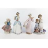 Four Lladro porcelain figurines, all of young children, 17cm and 23cm high, (4).