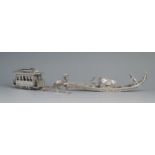 A silver filigree model of a Venetian gondola with hinged canopy, 15cm long, together with a white