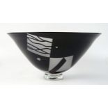 A Klas Goran deep ruby glass bowl, of flared form, with abstract designed opaque panels, 29.5cm