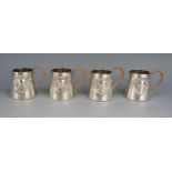 A set of four German silver miniature cream jugs, stamped marks, with rococo floral cartouche,