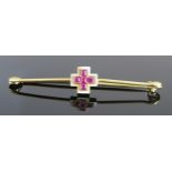A Ruby and Enamel White and Red Cross Brooch in a gold setting, indistinct continental mark, 55mm,