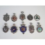 Ten assorted silver sport medallions and fobs, various makers and dates, total weight of silver