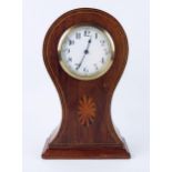 An Edwardian mahogany and inlaid balloon mantel timepiece, with 9cm Arabic dial, the circular