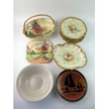 A Limoges porcelain part fruit service, with rose decoration, includes a low comport and five