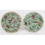 A pair of Cantonese export porcelain plates, decorated in enamels with birds, flowers and