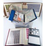 A collection of mostly loose British and world postage stamps, contained in a stock book, file and