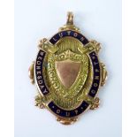 A 9ct gold and enamel football medal, Luton Wednesday Cup Competition, 5.9gms.
