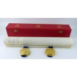 A Royal parchment of Grant of Arms, with two wax seals and contained in its original box with