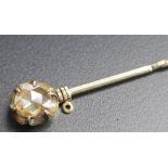 A Victorian Rose Cut Diamond Pin in an unmarked precious yellow metal setting, c. 5.3mm stone,