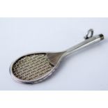 A novelty miniature pencil by S Mordan & Co, in the form of a Real tennis racket, 5.25cm long. A/F