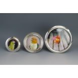 Three assorted silver circular photograph frames, various makers and dates, 17cm, 12cm and 9cm