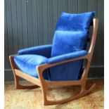 A Folke Ohlsson for Gimson & Slater a teak rocking chair, with refurbished upholstery.