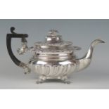 A George IV silver teapot, maker Waterhouse & Ryland, Birmingham, 1824, monogrammed, with moulded