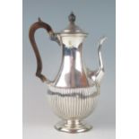 A Victorian silver coffee pot, maker William Hutton & Sons, London, 1881, of baluster form, with