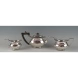 A late Victorian silver three-piece bachelors tea service, maker Thomas Bradbury & Sons, London,