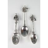 Three Dutch silver spoons, with oval bowls and sailing ship terminals, 22cm and 20cm long, total