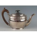 A George III silver oval teapot, maker Charles Chesterman II, London, 1804, with banded Greek Key