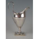 A George III silver cream jug maker Luke Proctor & Co, Sheffield, 1794, of helmet-shaped outline