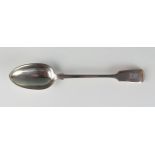 A Victorian silver Fiddle pattern serving spoon, maker Chawner & Co, London, 1852, monogrammed and