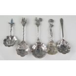 Five assorted continental and English silver spoons, sifting spoons preserve spoon etc, toytal