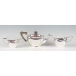 A George V silver three-piece bachelors tea service, maker Williams (Birmingham) Ltd, Birmingham,