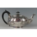 A George III silver teapot, maker Robert Garrard I, London, 1812, crested, of squat circular form,