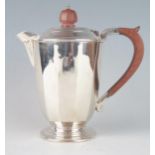 An Elizabeth II silver coffee pot, maker Mappin & Webb, Sheffield, 1961, of polygonal tapering form,