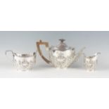 A Victorian silver three-piece tea service, maker Charles Stuart Harris, London, 1899/1900, of