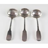 Three assorted silver Fiddle pattern sauce ladles, various makers and dates,186gms, 6.00ozs.