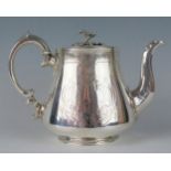 A Victorian silver teapot, maker George Angell & Co, London, 1850, of ovoid form, the hinged lid