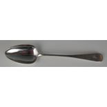 A George III silver Old English pattern serving spoon, maker IB, London, 1818, initialled, 31cm
