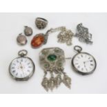 A Silver Cased Ladies Fob Watch, one other (both need attention), antique silver locket and other